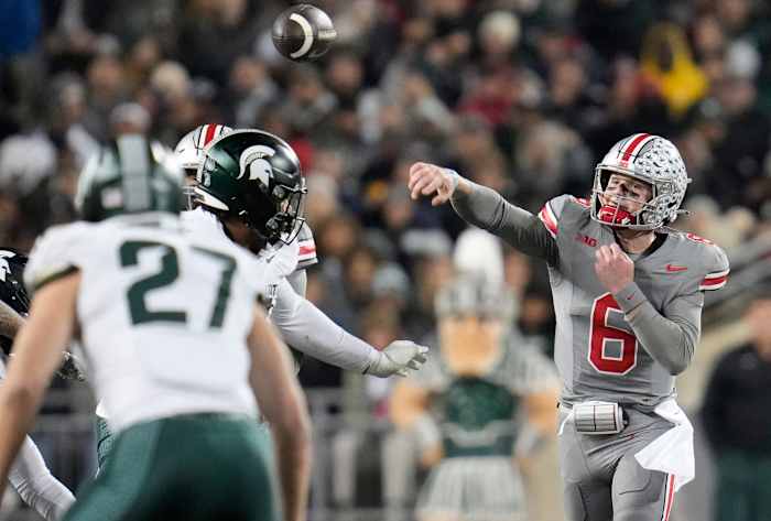 Ohio State quarterback Kyle McCord throws a pass at Ohio State against Michigan State.